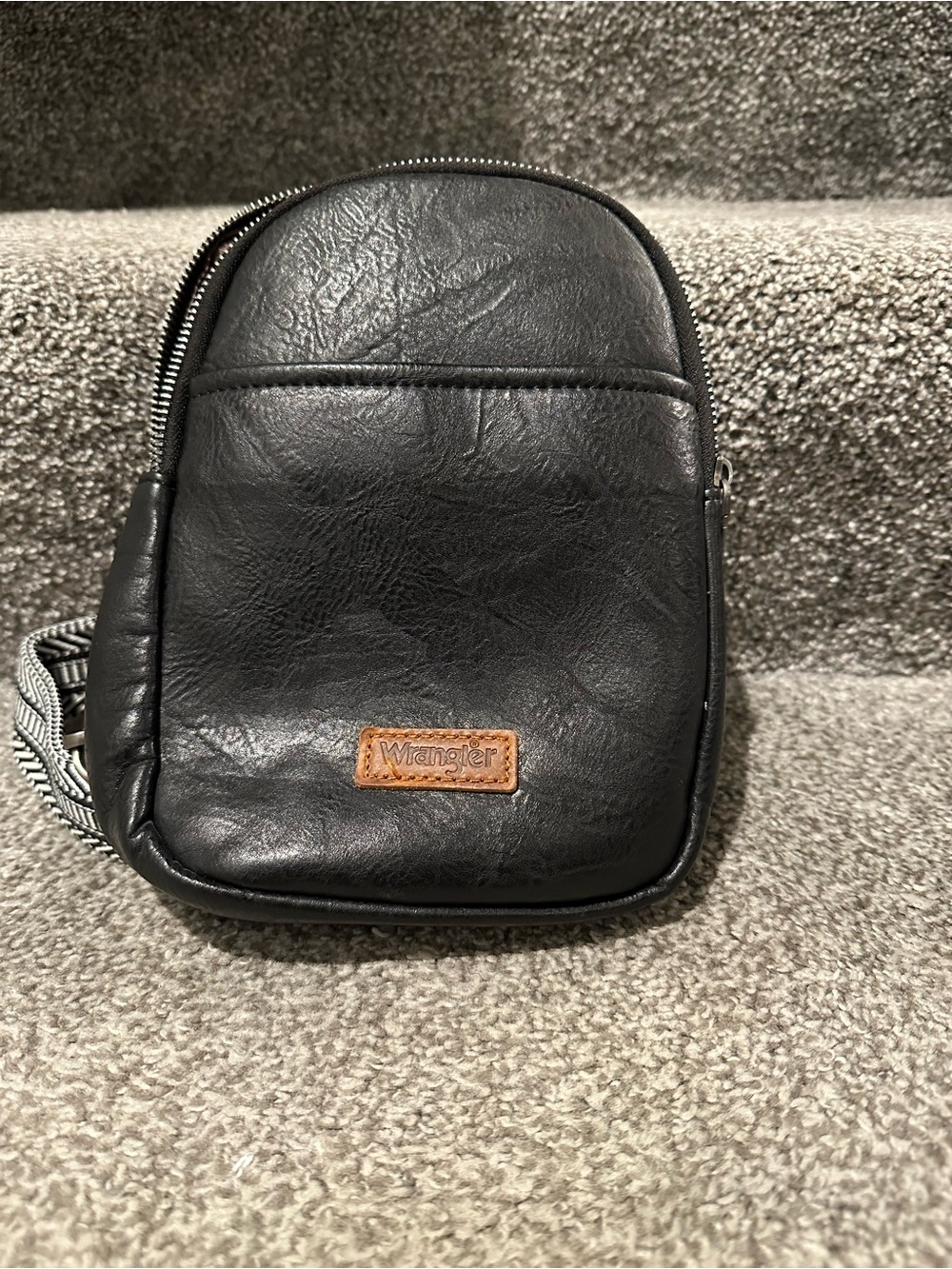 Wrangler Black Faux Leather Sling Bag with Brown Logo Patch